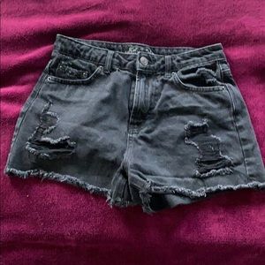 Black ripped shorts